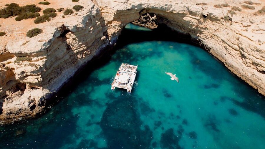 Albufeira: Caves and Coastline Catamaran Cruise to Benagil - Praia da Marinha and the cliff-to-cave lead-in