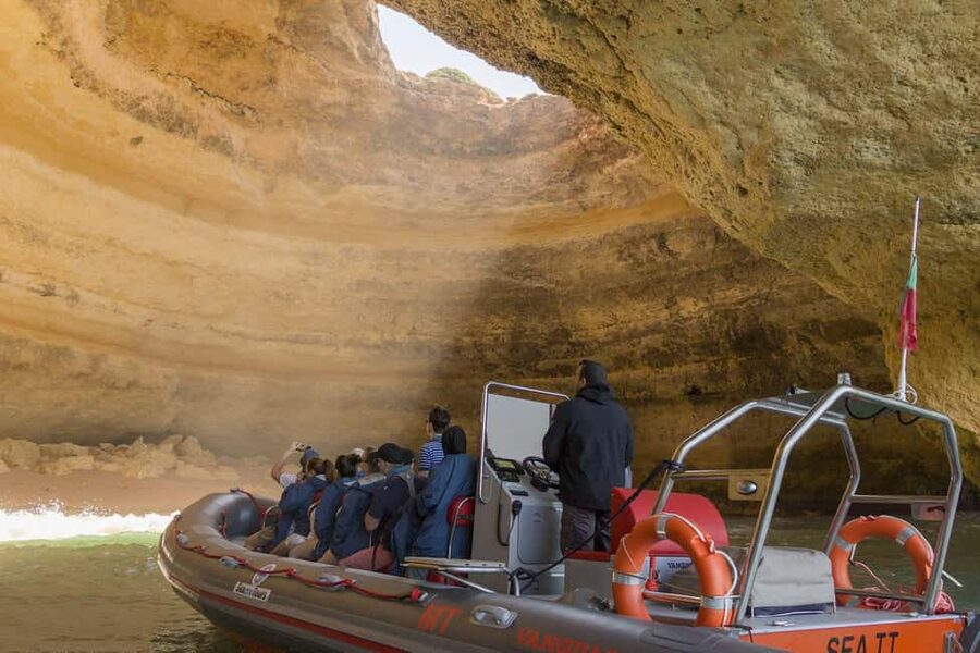 Albufeira: Dolphin Watching and Benagil Cave Boat Cruise - Choppy afternoons and fast-water reality: pack for spray and wind