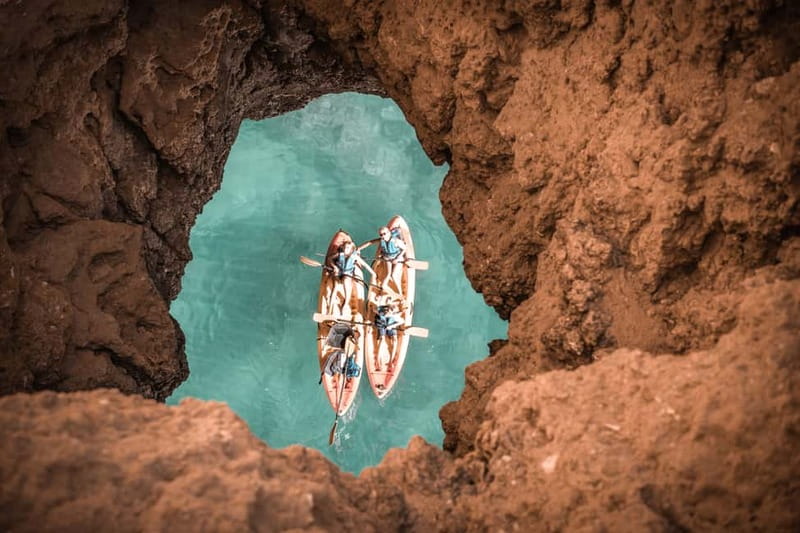 Albufeira: Hidden Beaches & Cliffs Guided Kayak Cave Tour - Paddling Past Praia da Coelha: Cliffs, Pass-By Views, and Easy Confidence