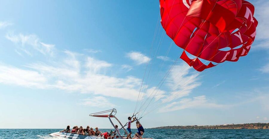 Albufeira: Single, Double or Triple Parasailing Tour - The boat segment: getting strapped in, then going up from the stern