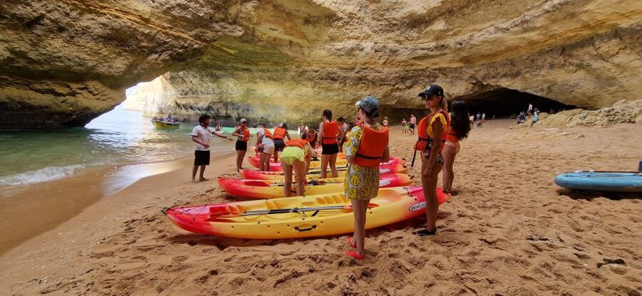 Benagil: Caves, Beaches, and Secret Spots Guided Kayak Tour - Meeting at O Litoral, then paddling past cliffs and fish-filled water
