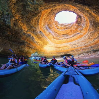Guided Kayak Tour inside caves and Praia da Marinha