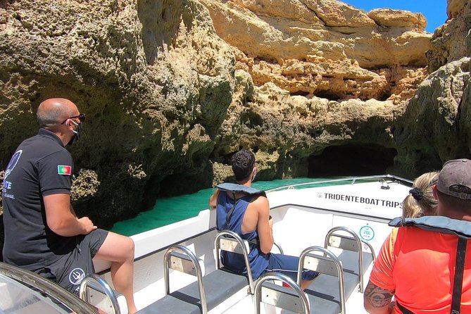 Exclusive Boat Tour to the Benagil Caves - Stop 4: Albandeira and the arch-in-the-water photo moment