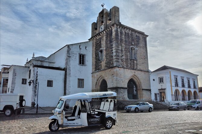 Faro City Tour on Electric Tuk tuks - Passing Carmo Church’s bone chapel, and how it fits the tour