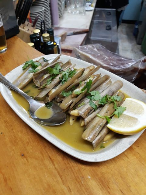 Faro: Old Town Guided Walking Food Tour - Drinks at Each Stop: Wine, Beer, and the Local Pace