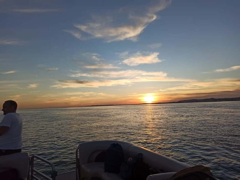 Faro: Sunset 1 hour Ria Formosa Boat Tour - On board the catamaran: comfort, safety, and what the guide actually does