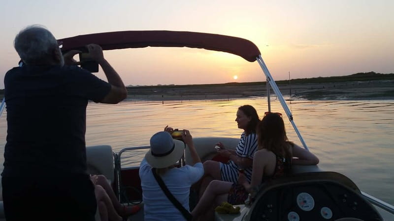 Faro: Sunset 1 hour Ria Formosa Boat Tour - Sailing the Ria Formosa channels: what you should look for as the light changes
