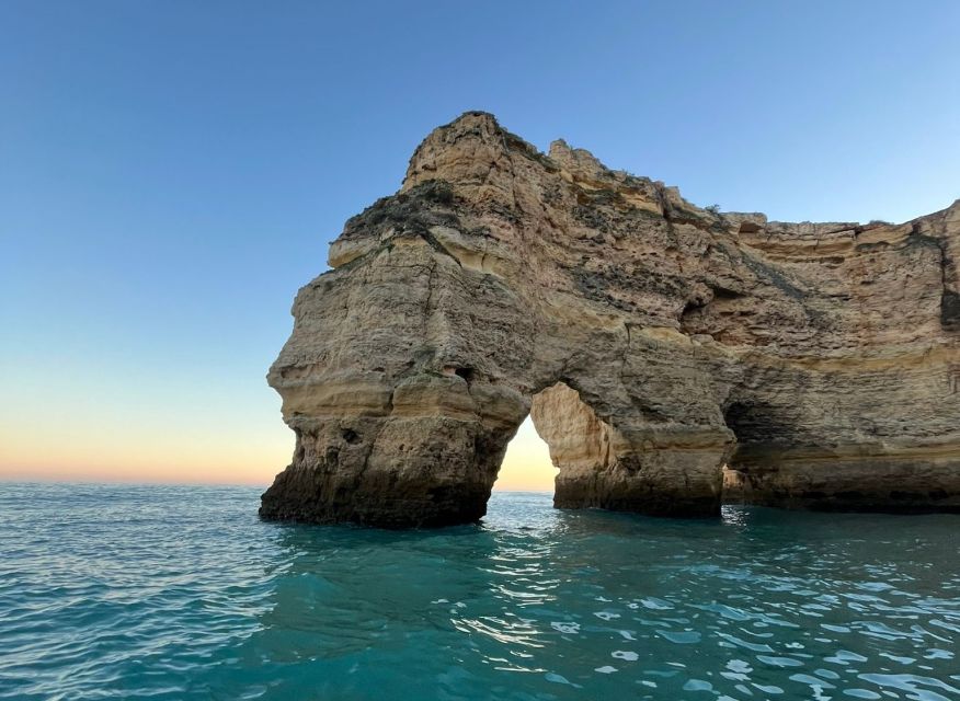 From Armação de Pêra: Sunset Benagil Caves Boat Tour - What you’ll see: the route from Praia dos Beijinhos to Benagil Cave