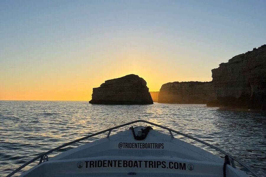 From Armação de Pêra: Sunset Benagil Caves Boat Tour - Included comfort: jackets, life-jackets, and staying sane in coastal weather