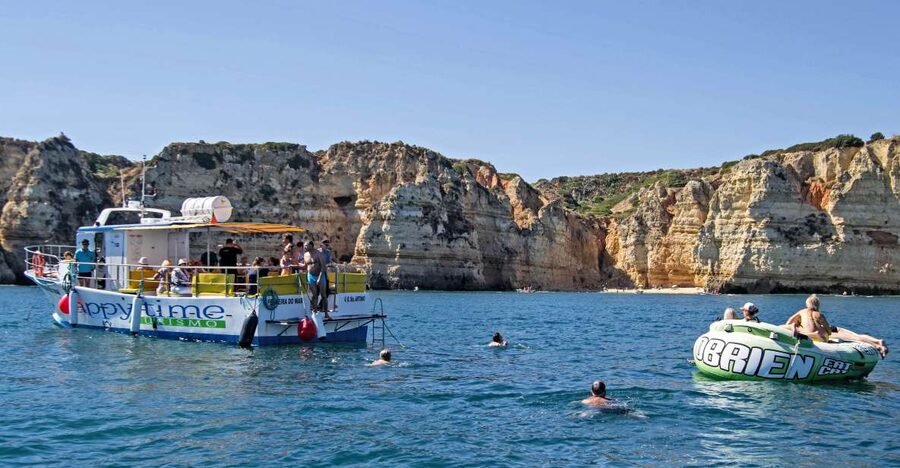 From Lagos: 2.5-Hour Guided Coastal Boat Tour & Grotto Visit - Cruising out of Lagos Marina, then along the navigation channel