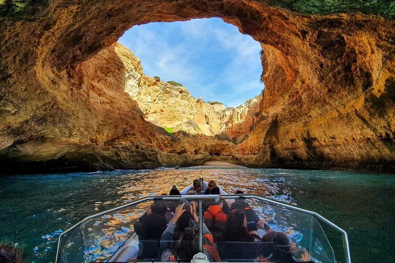 Inside the Benagil sea cave, looking up through the collapsed roof