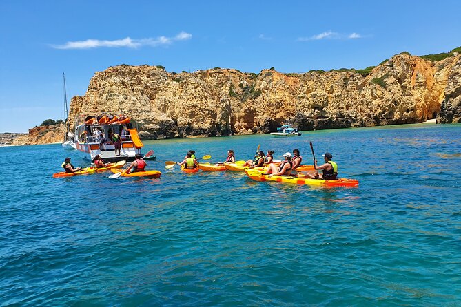 From Lagos: Kayak Tour of Ponta da Piedade Caves on Catamaran - Swimming, Snorkel-Style Breaks, and Photo Reality