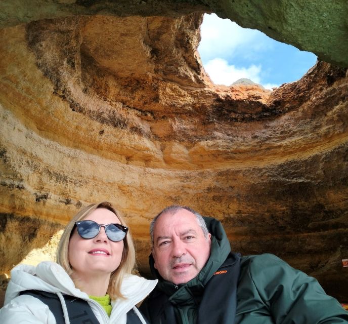 From Portimão: Benagil Caves & Marinha Beach Boat Tour - Benagil Cave Visit: Sunlight through the dome, from the boat
