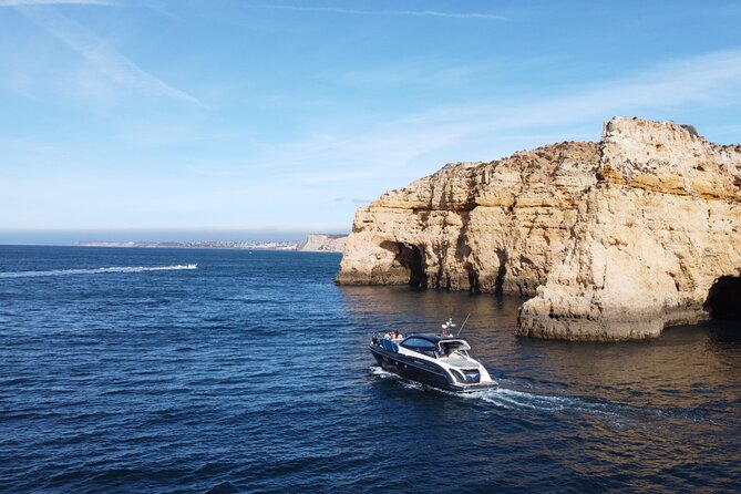 Half Day Private Charter morning /afternoon Yacht in Lagos - Praia do Camilo: a classic view from a long wooden staircase