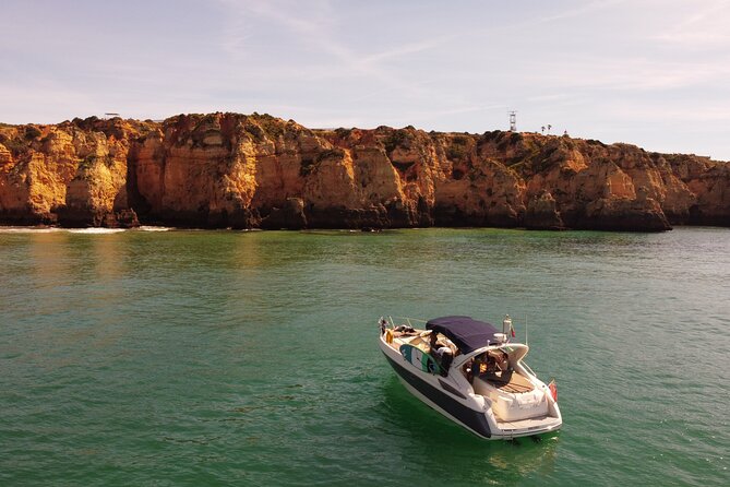 Half Day Private Luxury Yacht Charter in Lagos - Burgau: a sheltered beach with Portuguese presence and international company