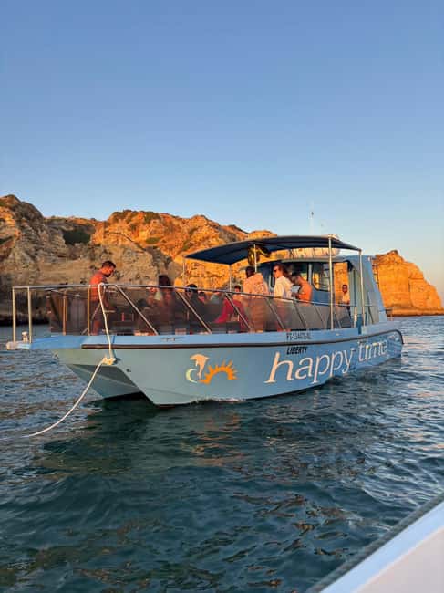 Lagos: Benagil Caves Catamaran Tour (2.5 hours) for the whole family - Liberty catamaran comfort, check-in, and the vibe onboard