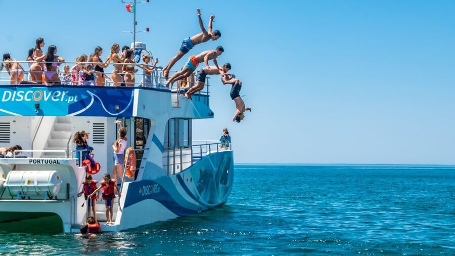 Lagos: Dolphins & Caves - Catamaran - The Water Slide Swim Stop in a Secluded Algarve Bay