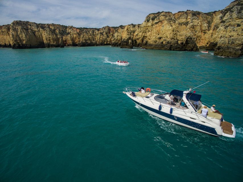 Lagos: Luxury Yacht Charter with Drinks & Tapas - Alvor lagoon: kitesurf roots, calm water time, and easy swimming options