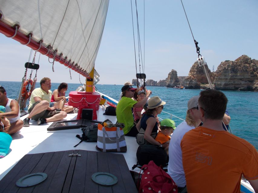 Lagos: Ponta Piedade Sail & Caves Cruise w/Portuguese Tapas - Swimming and sunbathing in clear Algarve water