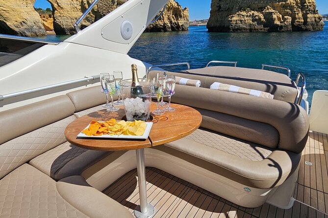 Lagos Private Boat Trip with Drinks, Snacks, Paddleboards Kayak - Private Cranchi Yacht Time, Plus a Route Your Captain Can Adjust