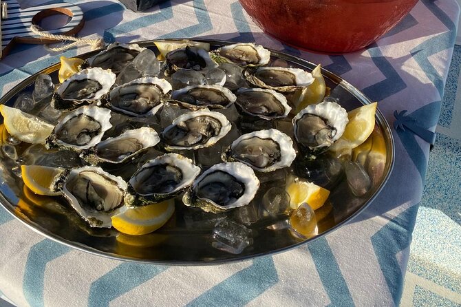 Olhão: Private Boat Tour, at Sunset with Oysters/Tapas and Drinks - Olhão Stop: Local Economy and Real-Place Stories, Not Fake Heritage