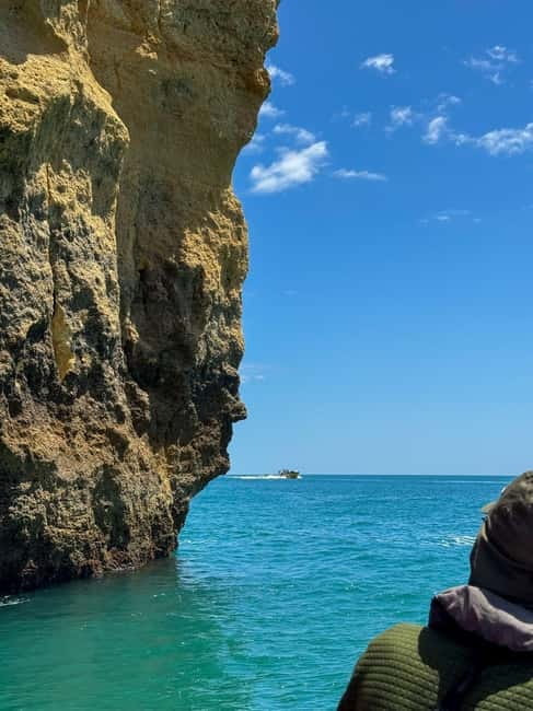 Portimão: Benagil Caves and Coastline Boat Tour - Boat comfort, life vests, and who might feel it in their back