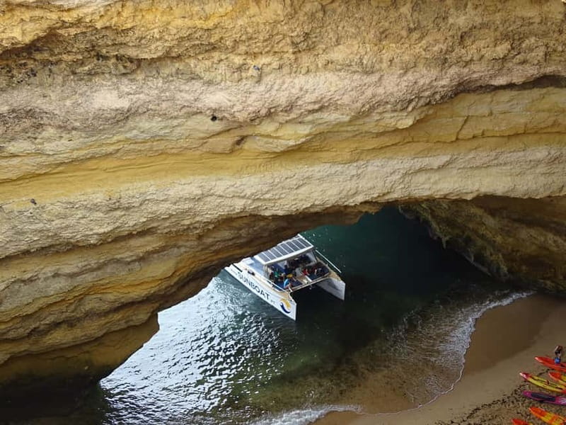 Portimão: Benagil Caves & Golden Coast Eco Catamaran Tour - A solar powered Benagil Caves trip from Portimão, without the noisy chaos