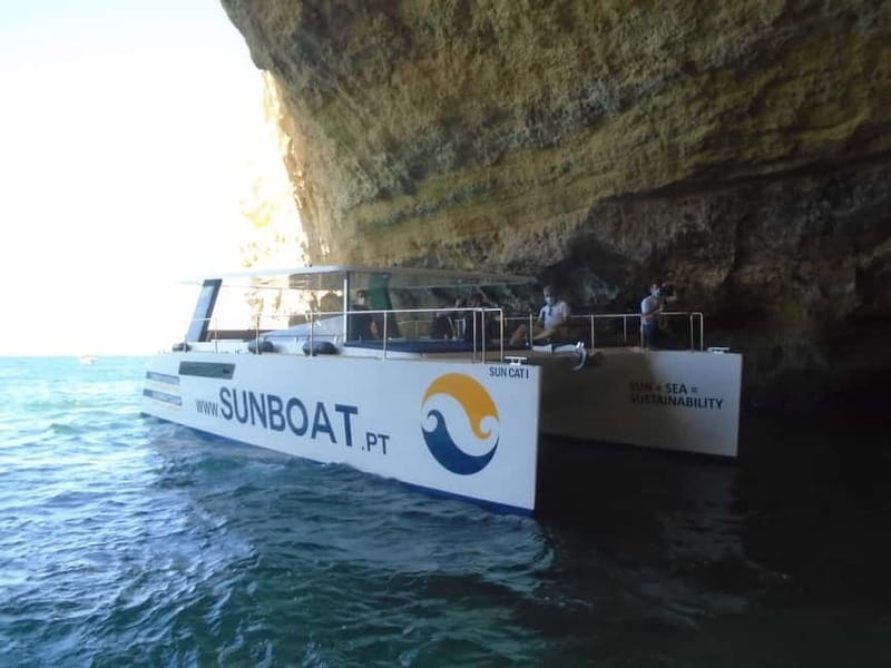 Portimão: Benagil Caves & Golden Coast Eco Catamaran Tour - Onboard comfort checklist: shade, lounge, music, and the bar