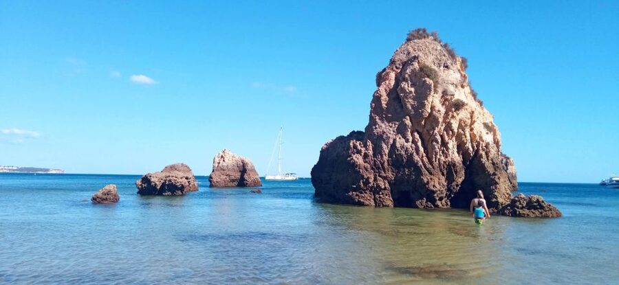 Portimão: Private Sailing Boat Tour with Swim and Wine - Ferragudo village and beach stop: classic Algarve views from close range