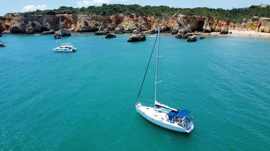Portimão: Private Sailing Boat Tour with Swim and Wine - Alvor stop with Portuguese white wine: a calm break that fits the scenery
