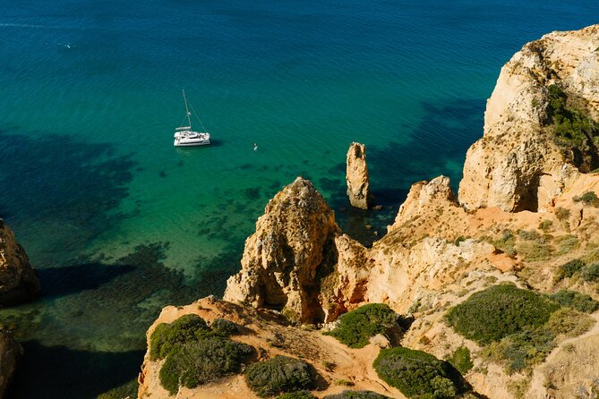 Private Catamaran Tour Lagos Coast and Ponta da Piedade - The calm bay swim stop: snorkeling and paddle boarding without the hassle