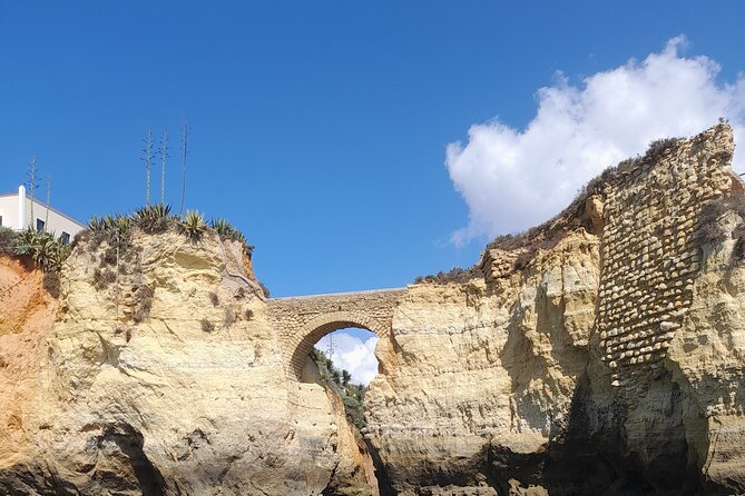 Private Coast Tour From Lagos, With a Visit to Algarve Potery - Praia da Rocha: long sandy beach plus a fortress backdrop