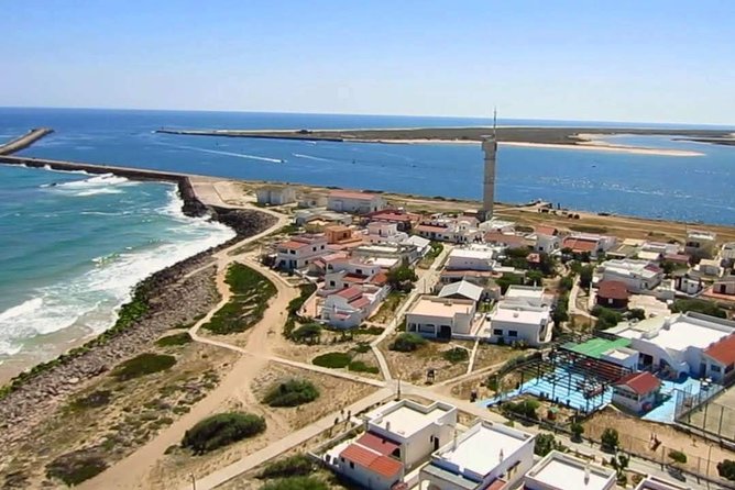 Private Half-Day Boat Tour in Ria Formosa from Faro - Stop 2: Farol Island lighthouse village and Cabo de Santa Maria views