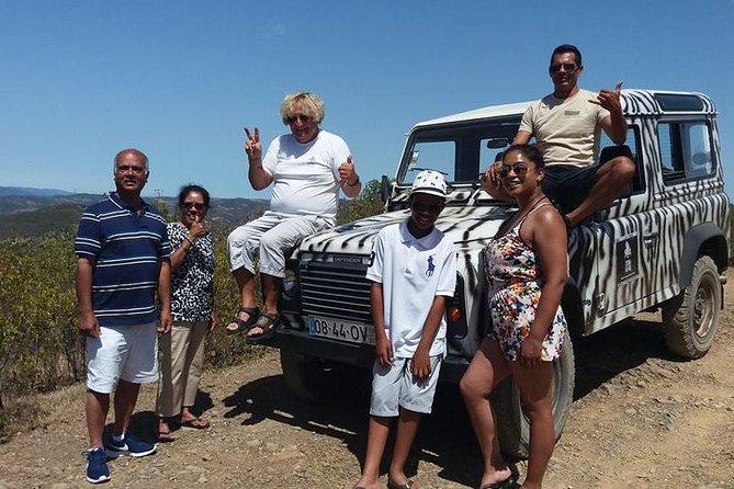 Safari & Boat Tour - Mountains & Dolphins - The coast by boat: caves, algares, and a dolphin search
