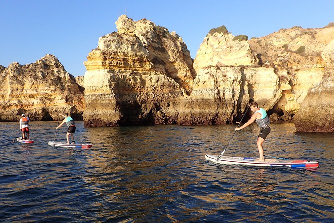 Sunrise SUP Caves Tour in Lagos – Small Group Experience - Arches, tunnels, and the Love Cave stop you will remember