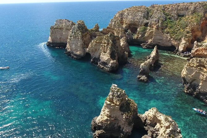 Tour to inside the Caves /Grottos the Ponta da Piedade -Lagos - Timing Tips: Sunny Day Comfort vs. Wavey-Day Reality